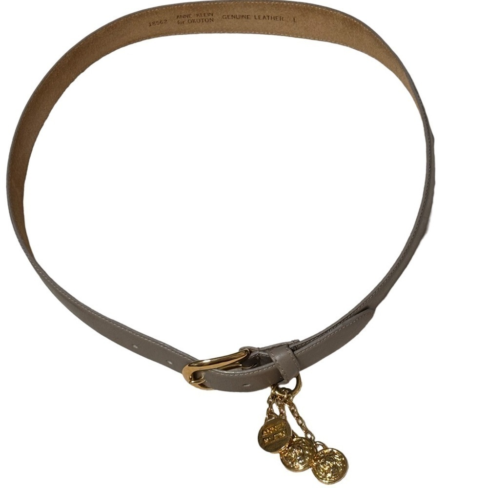 Anne Klein taupe large leather belt with lion tassels